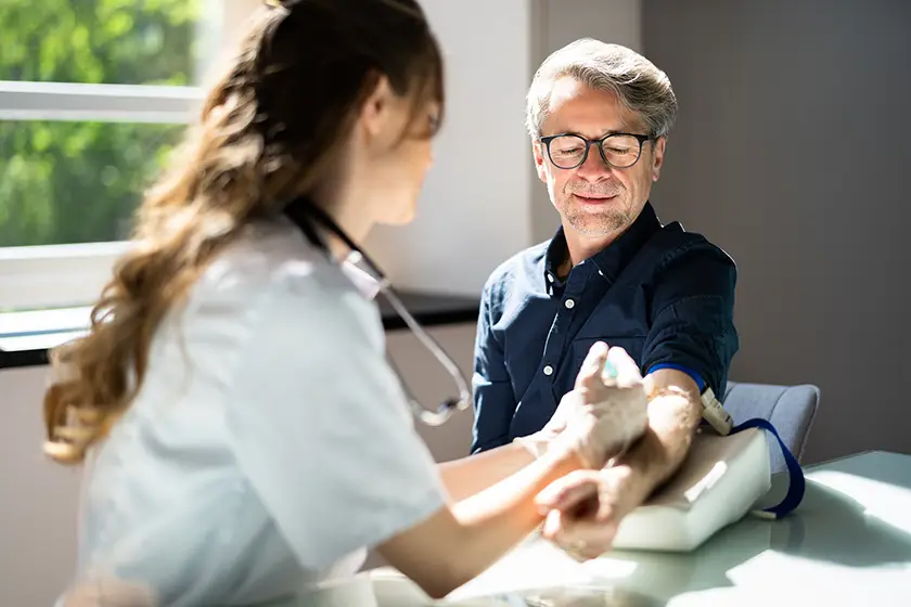 Pharmacist consulting with patient at Lord Street Pharmacy